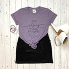 Black short-sleeve graphic tee by The Graphic Tee featuring bold "Just WTF-ing My Way Through Life" text on the front.