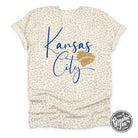 Kansas City Baseball Natural Leopard SS Graphic Tee by The Graphic Tee, featuring a stylish leopard print design on a casual short-sleeve shirt.