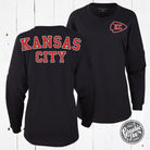 Kansas City Black Ladies Pom Pom Jersey LS Graphic Tee by The Graphic Tee, showing a casual long-sleeve shirt with pom pom details.