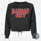 Kansas City Glitter Leopard Crop Sweatshirt by The Graphic Tee, featuring a stylish leopard print and glitter accents.