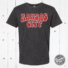 Unisex Kansas City Glitter Leopard graphic T-shirt from The Graphic Tee, featuring a vibrant glitter leopard design.