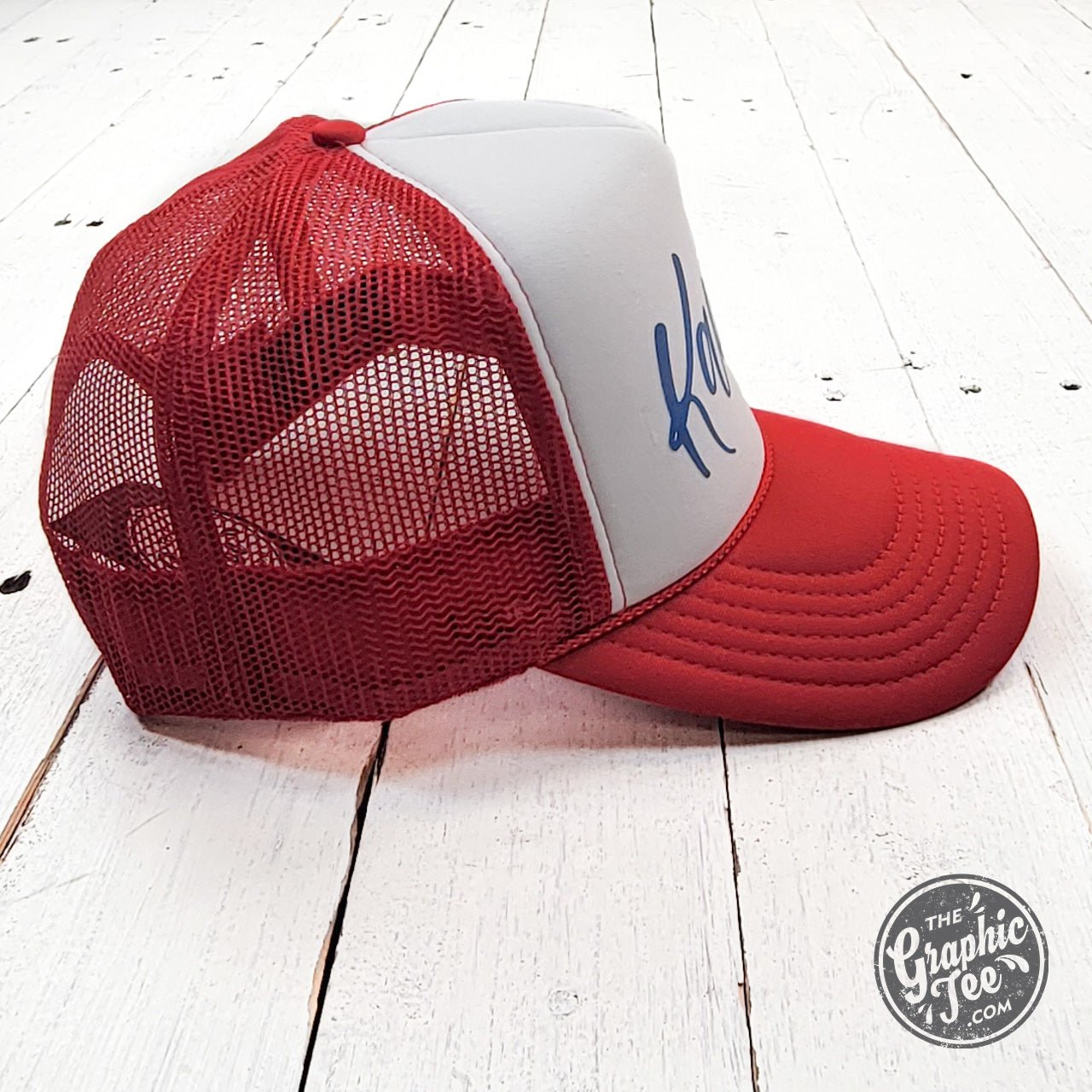 Kansas Red and White Foam Trucker Cap by The Graphic Tee with adjustable snapback and embroidered Kansas logo.