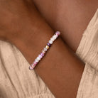 Women's gold bracelet featuring amethyst and cubic zirconia stones from Karma and Luck's Calm Spirit collection.