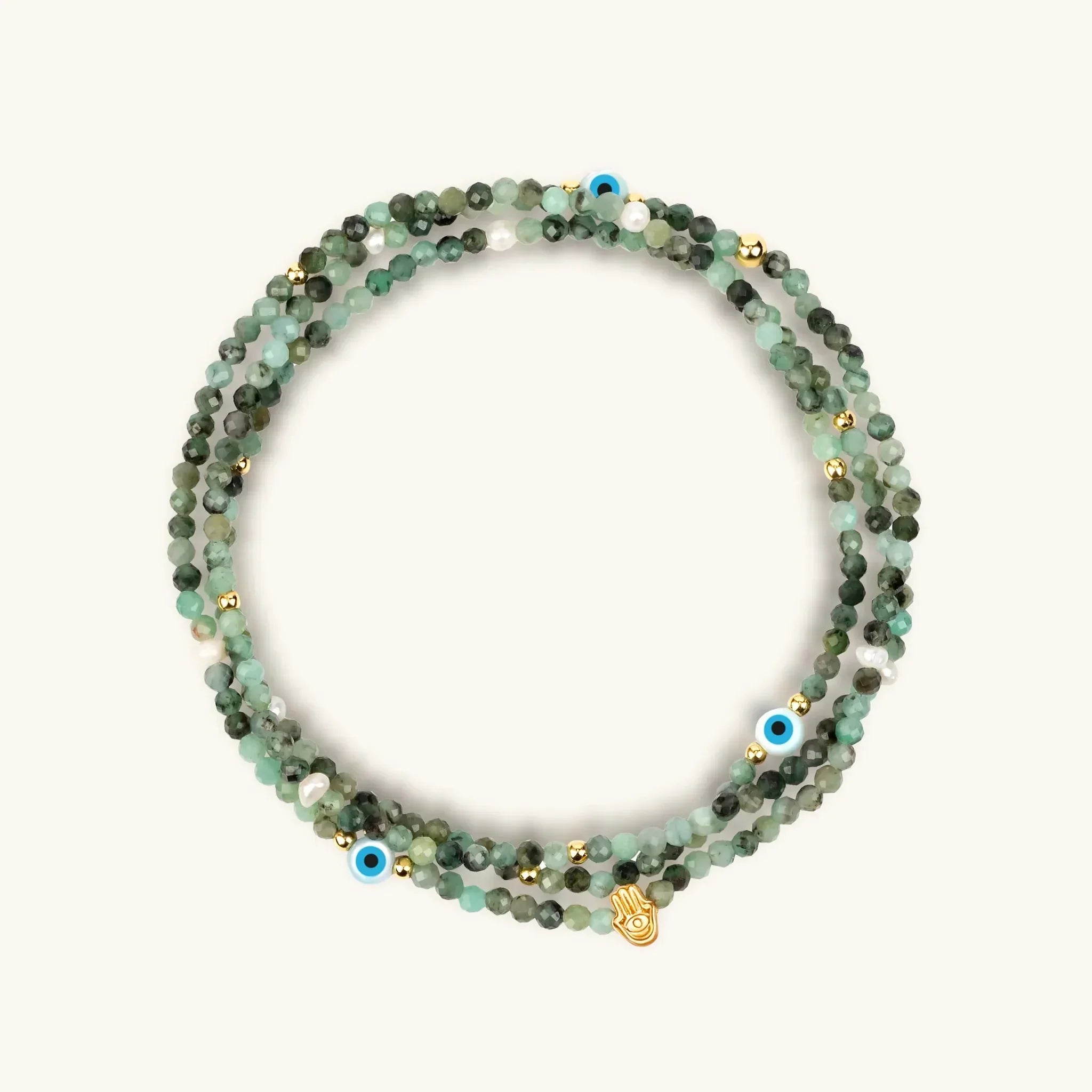 Women's emerald May birthstone wrap bracelet by Karma and Luck featuring a captivating spirit design and adjustable fit.