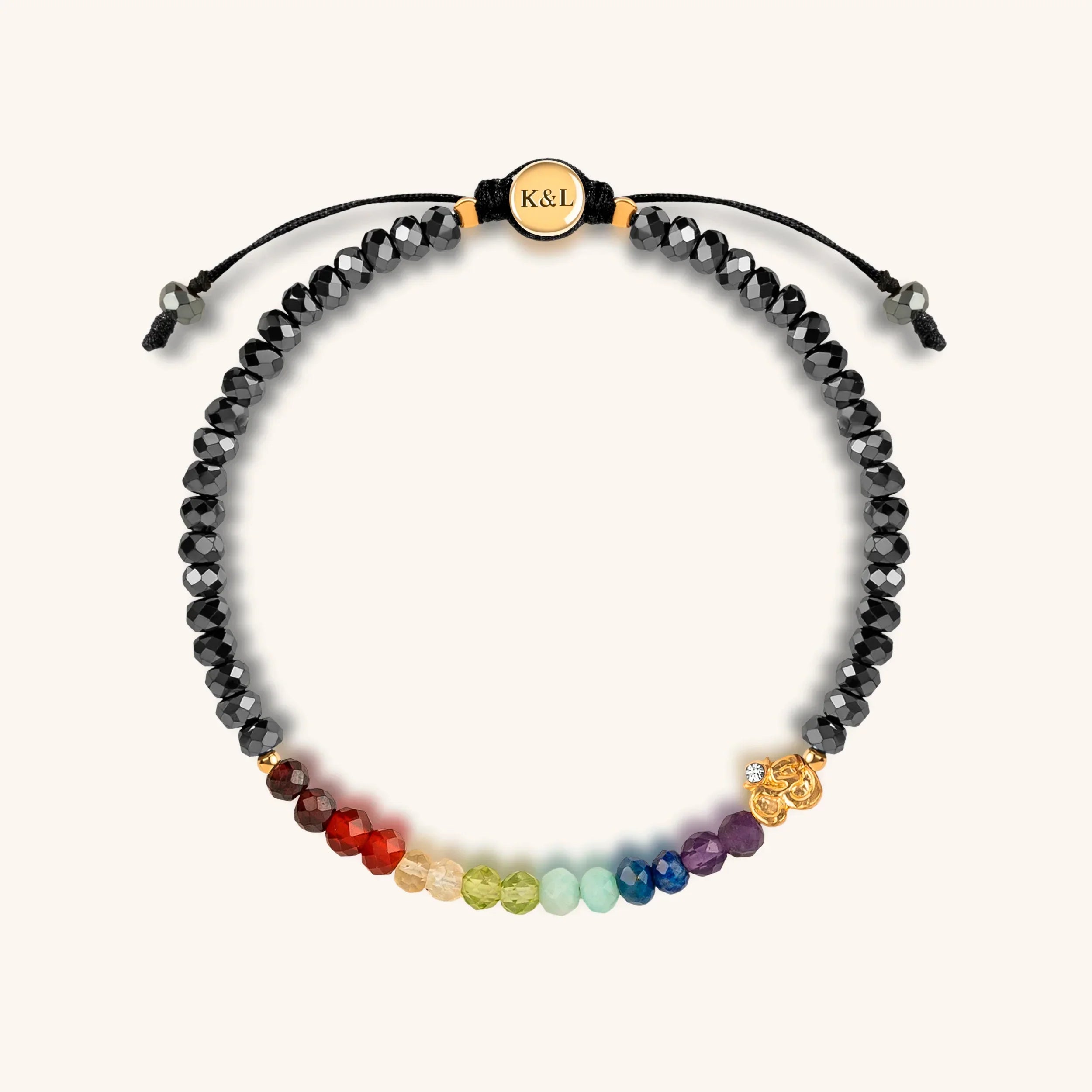 Gold OM Hematite Chakra bracelet for women, featuring grounding and balancing design with spiritual gemstone accents.