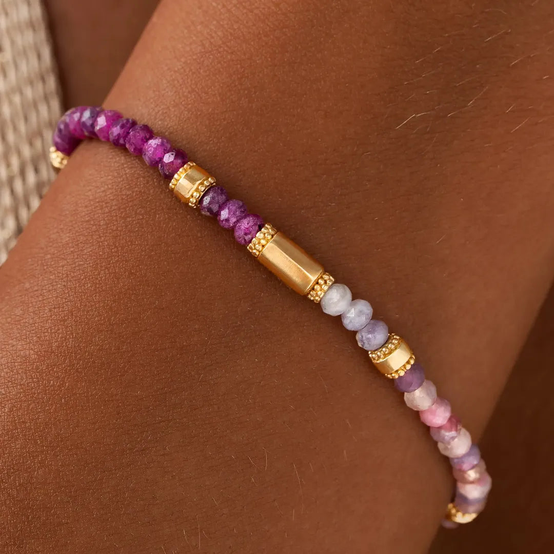 Karma and Luck Heartline Harmony women's bracelet with ruby and pink tourmaline, featuring a drawstring design.