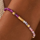 Karma and Luck Heartline Harmony women's bracelet with ruby and pink tourmaline, featuring a drawstring design.