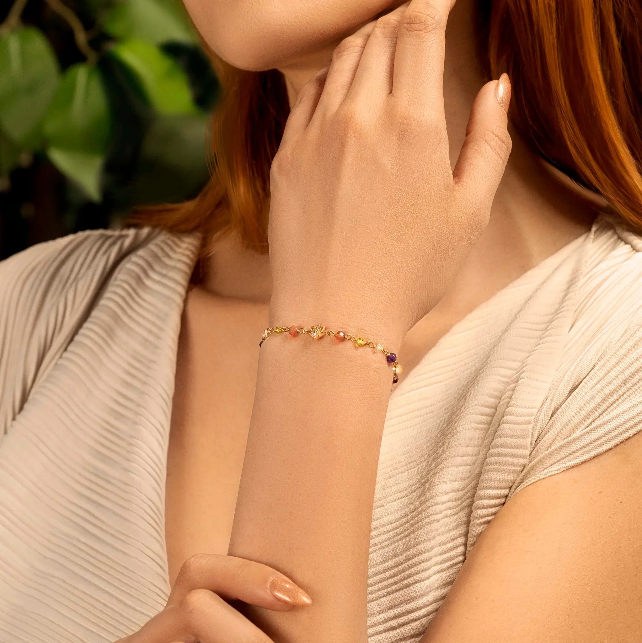Women's Karma and Luck Invigorated Life multi-stone chakra lotus charm bracelet with colorful stones and intricate lotus design.