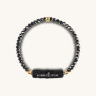 Karma and Luck Peaceful Harmony Swarovski Crystal Hematite Chakra Bracelet for women, featuring dark hematite and sparkling crystals.