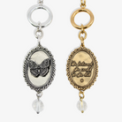 Katia Designs butterfly choker necklace in antique gold, featuring a delicate butterfly pendant and adjustable chain.