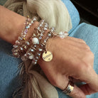 Katia Designs crystal boho wrap bracelet and necklace with a heart-shaped crystal pendant, featuring a layered, bohemian style.