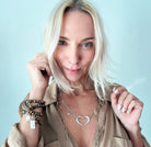 Katia Designs crystal boho wrap bracelet and necklace featuring heart-shaped crystal accents and bohemian style.