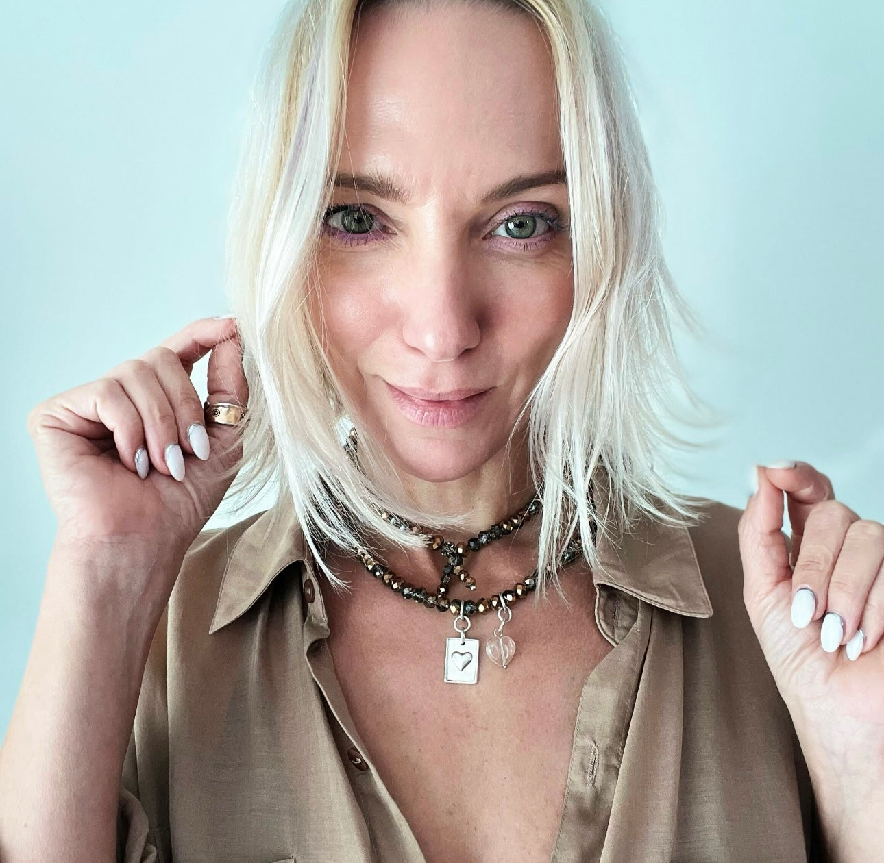 Katia Designs crystal boho wrap bracelet and necklace featuring a heart-shaped crystal in a stylish, layered design.