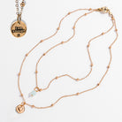 Katia Designs dainty antique gold necklace with black lips, pearl, and "I Am Enough" heart pendant, delicate and elegant jewelry piece