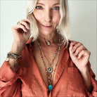 Dainty antique gold necklace with black lip pearl and heart pendant by Katia Designs, "I Am Enough" phrase visible.