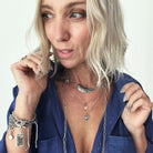 Dainty antique gold necklace by Katia Designs featuring a black lip pearl and a heart pendant with "I Am Enough" engraving