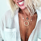 Dainty antique gold I Am Free key necklace by Katia Designs featuring a delicate chain and a small key pendant.