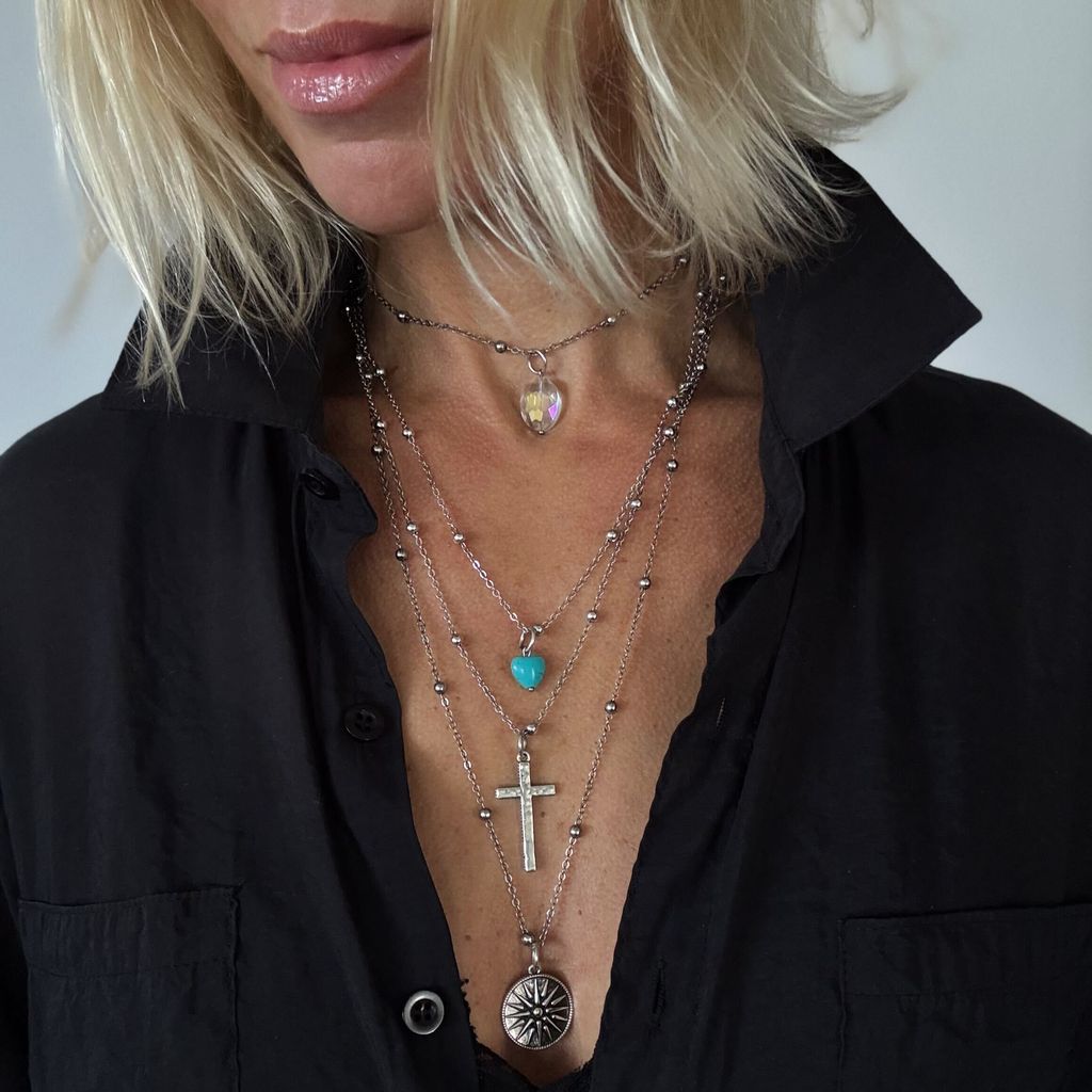 Silver dainty necklace featuring a star pendant, from Katia Designs, with the phrase "This Too Shall Pass" engraved.