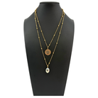 Silver dainty necklace by Katia Designs featuring a star pendant with the phrase "This Too Shall Pass".