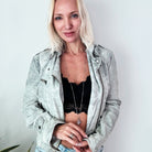 Dainty silver necklace by Katia Designs featuring a star pendant and the phrase "This Too Shall Pass."