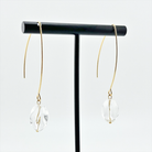 Katia Designs small stone drop earrings with antique gold finish and clear crystal quartz accents, elegant jewelry for women.