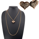 Katia Designs Heart Locket Essential Necklace in antique gold with a delicate heart-shaped pendant on a fine chain.