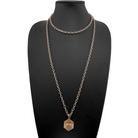 Katia Designs Have Faith essential necklace in antique gold with a pendant featuring the word "Faith" on a delicate chain.