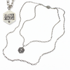 Antique gold Have Faith essential necklace by Katia Designs featuring a delicate pendant on a fine chain.