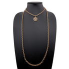 Antique gold Have Faith essential necklace by Katia Designs featuring a delicate pendant on a fine chain.