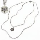 Antique gold Have Faith essential necklace by Katia Designs featuring a simple, elegant pendant on a delicate chain.