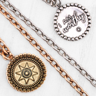 Katia Designs I Am Worthy Sun Essential Necklace in antique gold with sun pendant, showcasing elegant jewelry design.