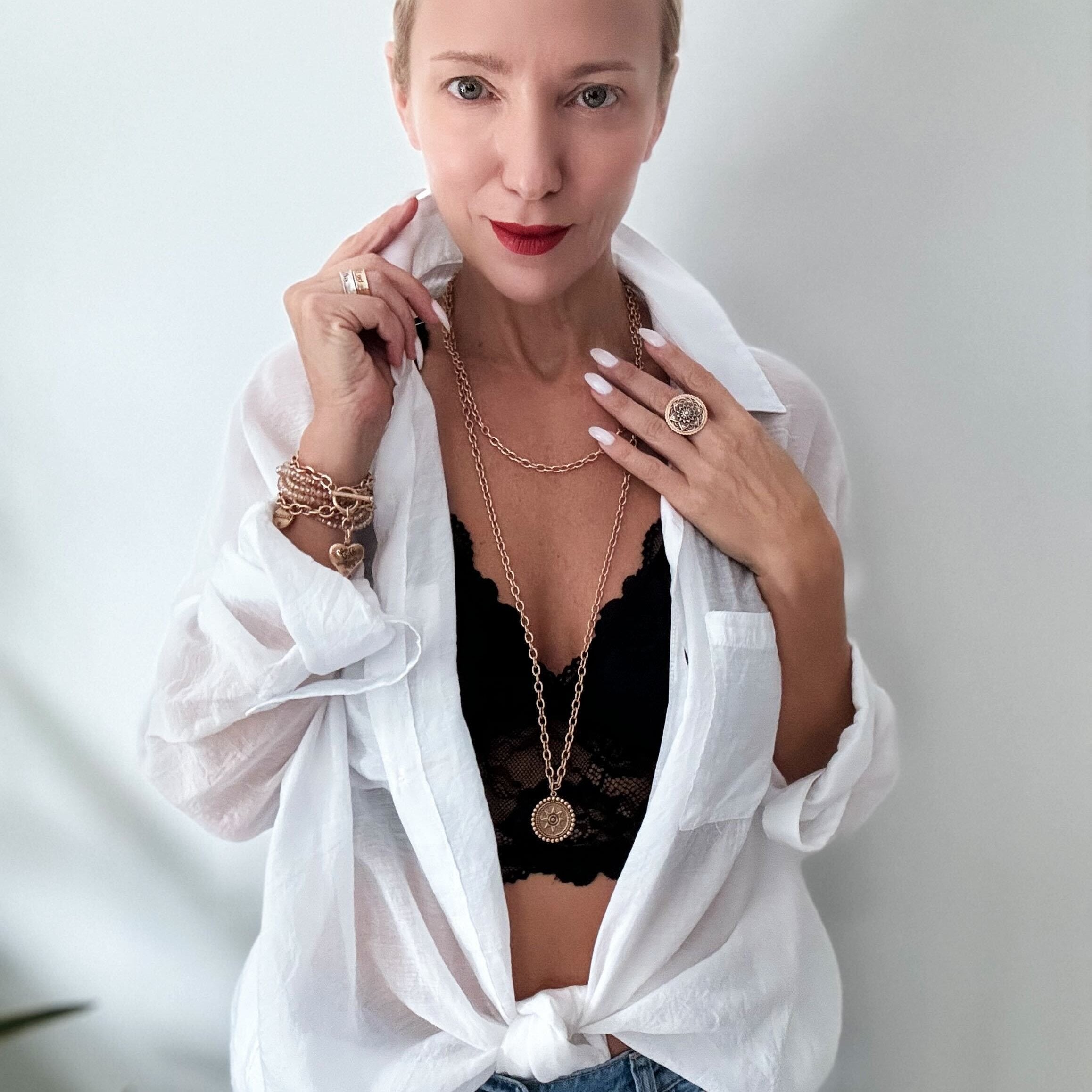 Katia Designs I Am Worthy Sun Essential Necklace in antique gold, featuring a sun pendant on a delicate chain.