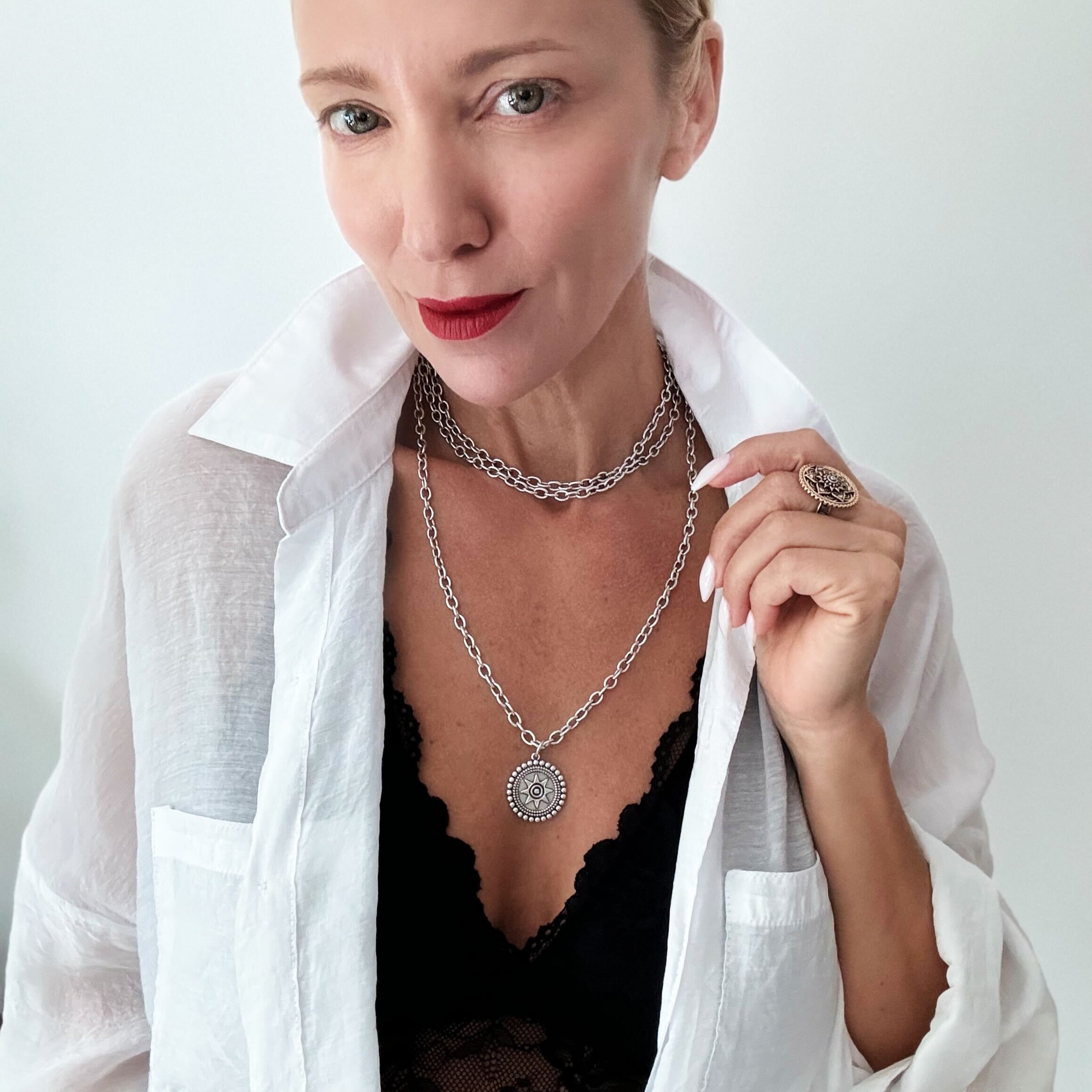 Katia Designs I Am Worthy Sun Essential Necklace in antique gold, featuring a sun pendant on a delicate chain.