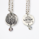 Katia Designs Listen Madame Butterfly Essential Necklace in antique gold showing a delicate butterfly pendant on a chain.
