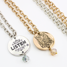 Katia Designs Listen Madame Butterfly Essential Necklace in antique gold featuring a delicate butterfly pendant and chain detail