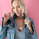Katia Designs Listen Madame Butterfly Essential Necklace in antique gold, featuring elegant butterfly pendant and delicate chain.