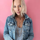 Katia Designs Listen Madame Butterfly Essential Necklace in antique gold with delicate butterfly pendant and chain.
