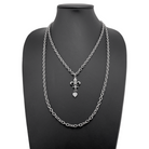 Katia Designs Love Fleur-de-Lis Essential Necklace in antique gold with intricate fleur-de-lis pendant on a delicate chain