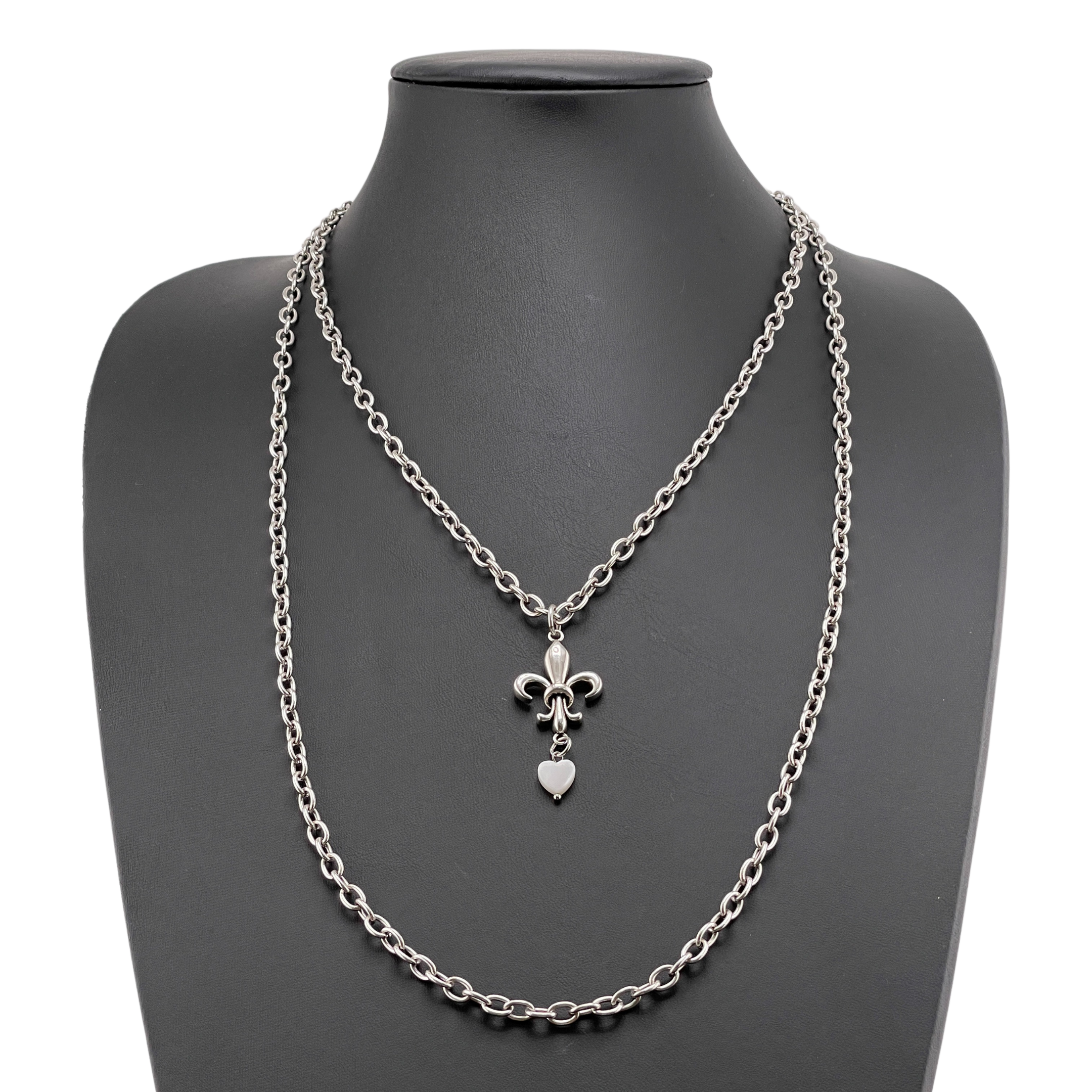 Katia Designs Love Fleur-de-Lis Essential Necklace in antique gold with a detailed fleur-de-lis pendant on a delicate chain