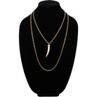 Katia Designs Love Tusk Essential Necklace in antique gold with a heart-shaped pendant and delicate chain.