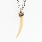 Katia Designs Love Tusk Essential Necklace in antique gold featuring a delicate tusk pendant on a fine chain.