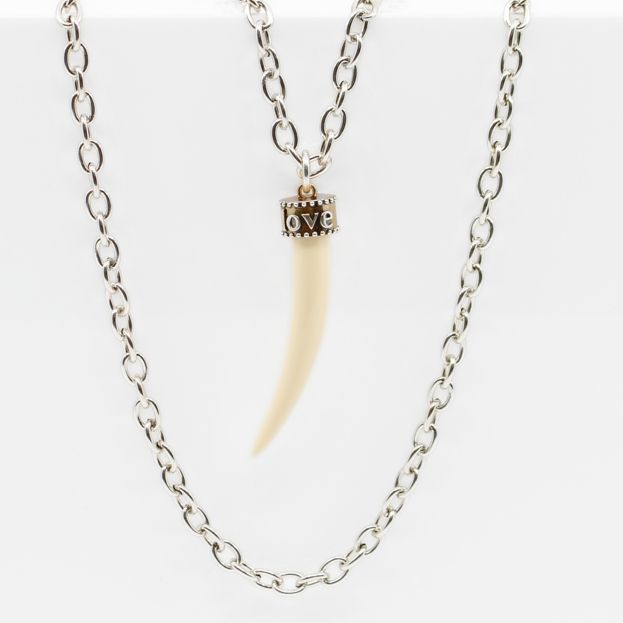Katia Designs Love Tusk Essential Necklace in antique gold featuring a delicate Tusk pendant on a fine chain