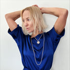Katia Designs Trust Moon Phase Essential Necklace in antique gold, featuring a moon phase pendant on a delicate chain.