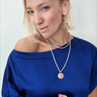 Katia Designs Trust Moon Phase Essential Necklace in antique gold featuring a delicate moon phase pendant on a fine chain.