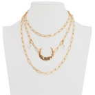 Katia Designs long chain necklace featuring a lightweight gold crescent moon pendant on an elegant antique gold chain.
