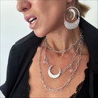 Katia Designs long chain necklace with light crescent moon pendant in antique gold, elegant jewelry for layered style.
