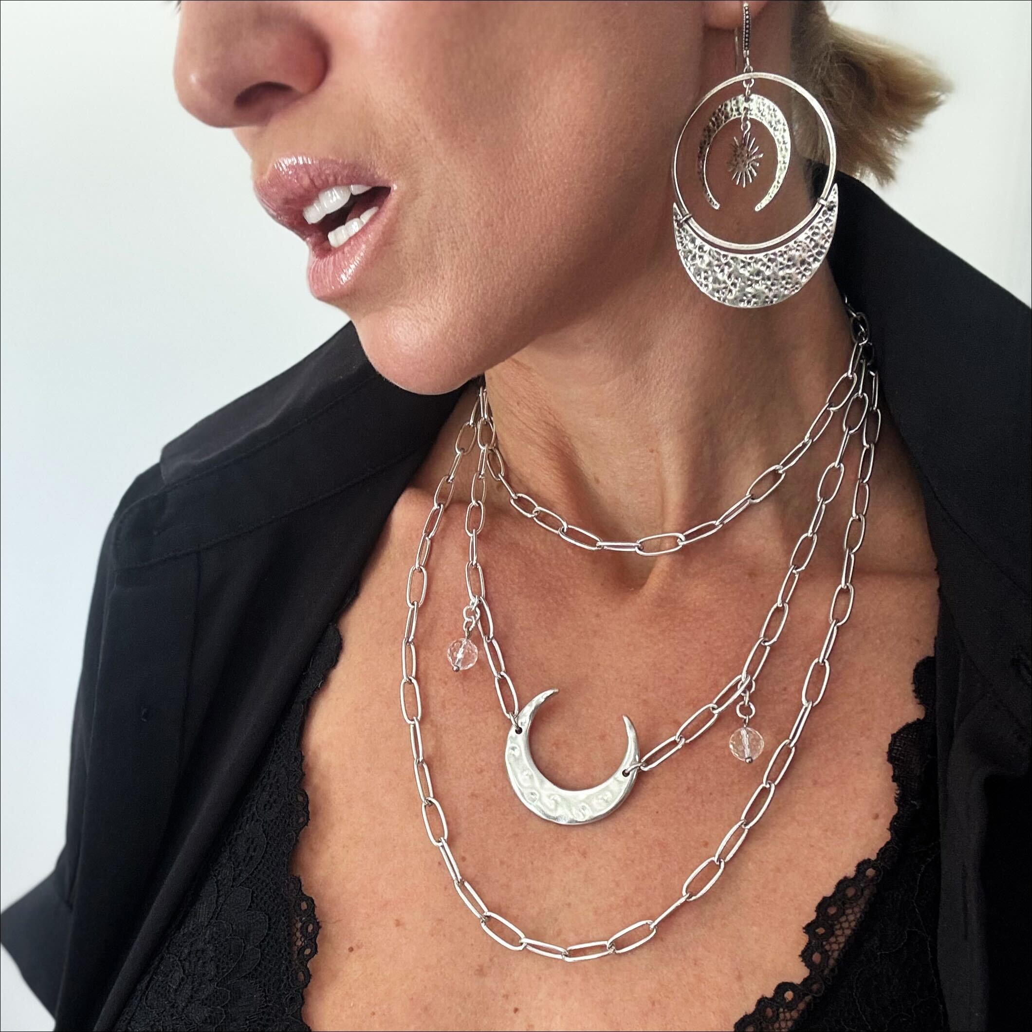 Katia Designs long chain necklace with light crescent moon pendant in antique gold, elegant jewelry for layered style.