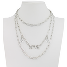 Katia Designs antique gold Love long chain necklace with intricate pendant and textured links, elegant jewelry accessory.