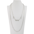 Long gold chain necklace with love pendant by Katia Designs, featuring an antique finish and elegant design.