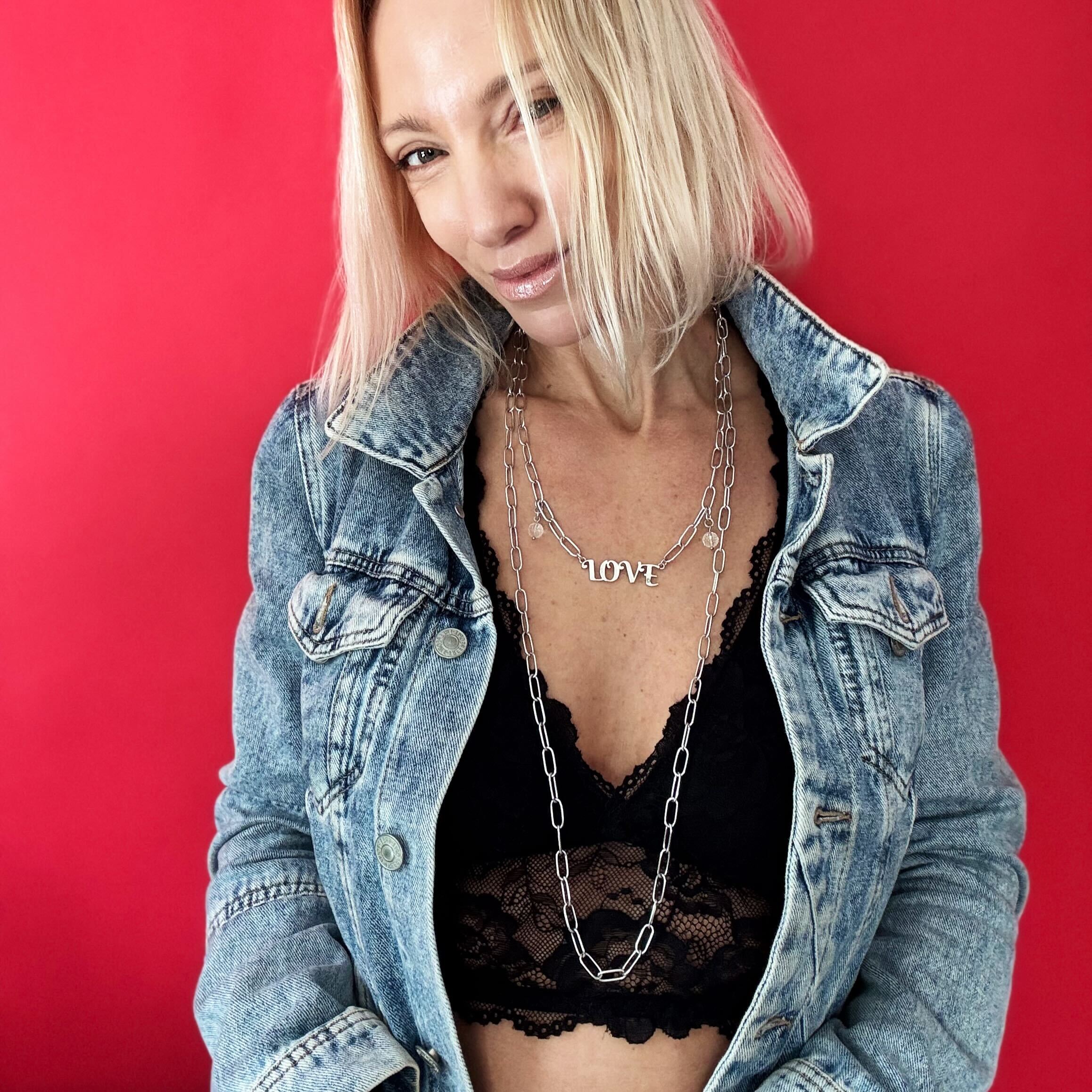 Katia Designs antique gold Love long chain necklace with intricate links, stylish and elegant jewelry accessory.